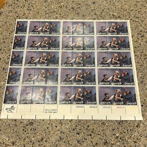 Full page of USA $.13 spirit of 76 postage stamps.